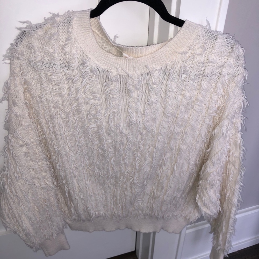 Fluffy white sweater